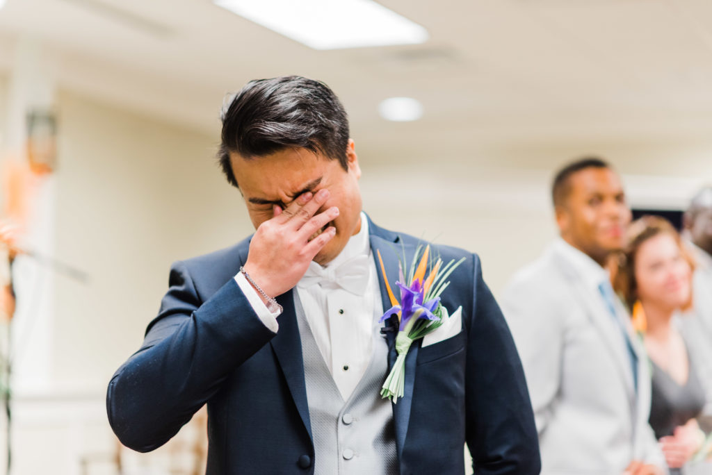 Josh, the groom, cried as he first saw Jasmin, the bride,  coming down the aisle.. Photo by Black Tie & Co. www.btcweddings.com