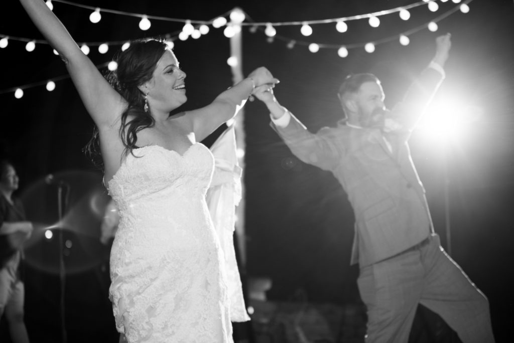 newlyweds dance at their receptionQueen's Harbour country club in Jacksonville Florida Photography by Chabeli Woolsey Black Tie & Co www.btcweddings.com