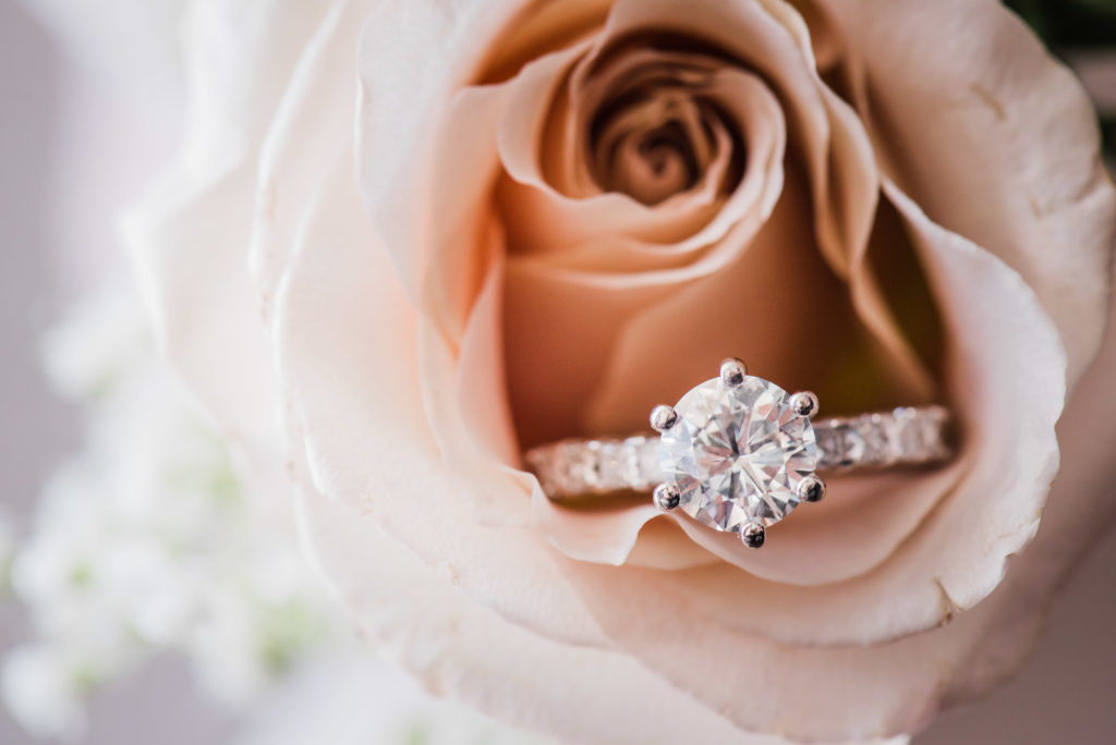 Wedding Ring in blush rose taken in the hotel room at the one ocean spa resort. Photography by Chabeli Woolsey Black Tie & Co www.btcweddings.com