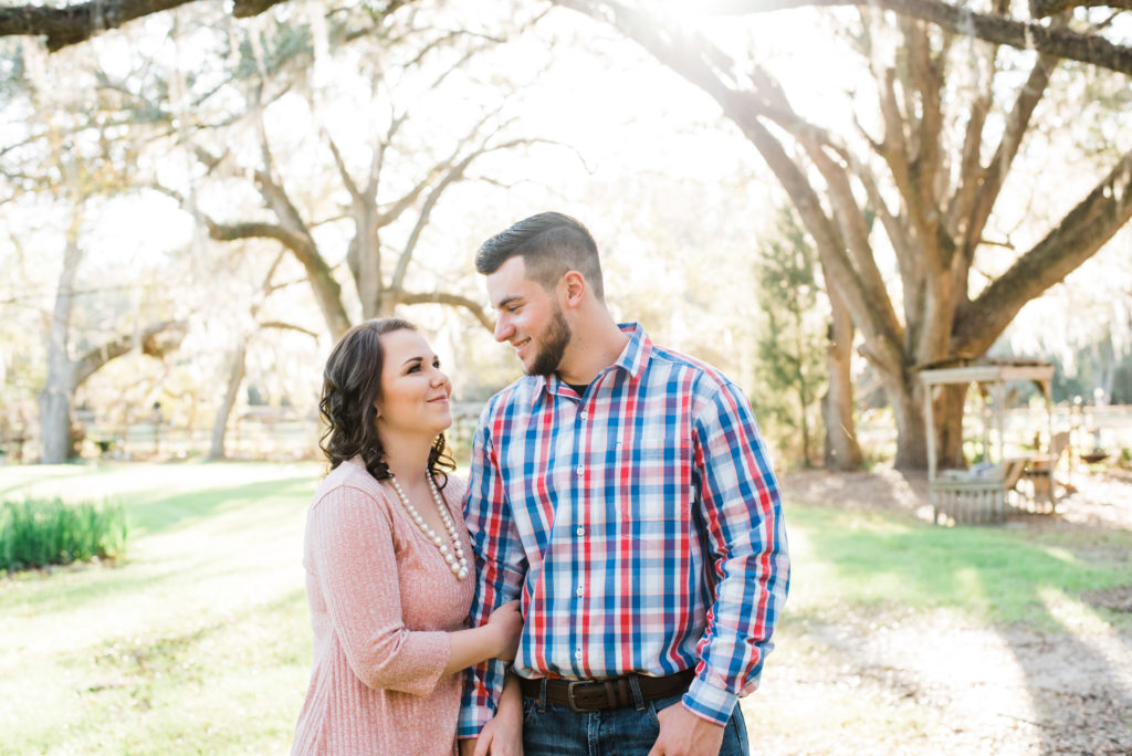 engagement photos at southern pines wedding venue in lake city Florida. Photo by Chabeli Woolsey Black Tie & Co www.btcweddings.com